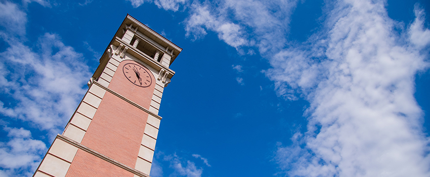 Moulton Tower with clouds in the background.