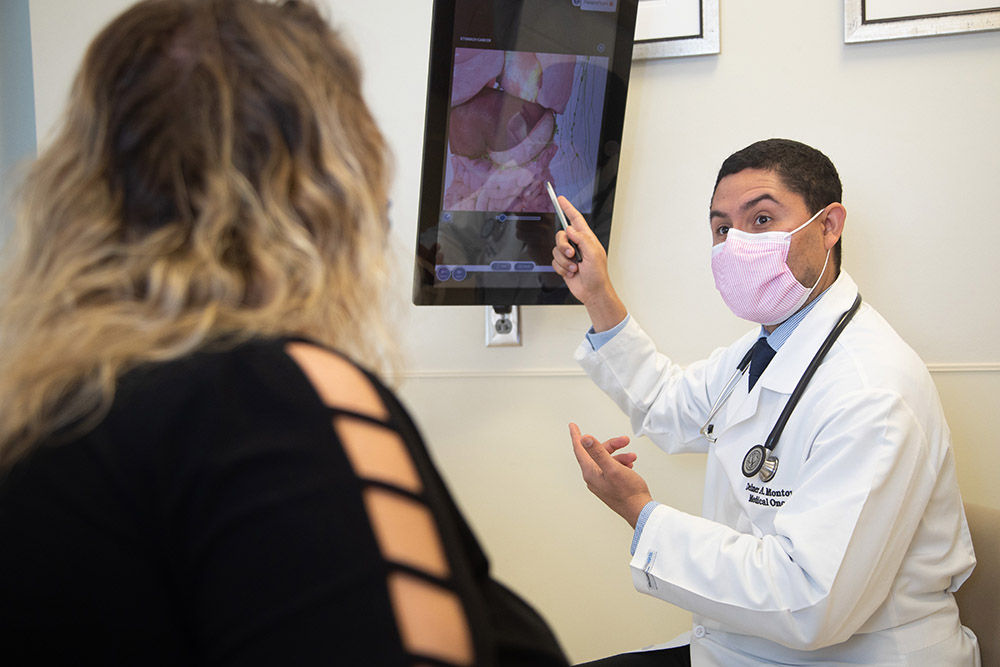 Medical Oncology fellow with a patient