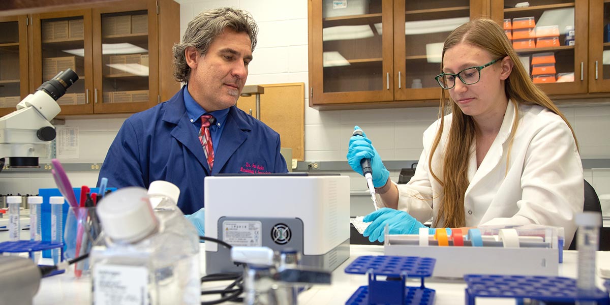 Dr. Audia and Amanda Tuckey in lab