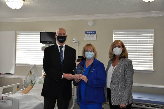 Left to Right: Dr. David Turnipseed, USA Mitchell College of Business; Dr. Lori Wichman, Baptist Health Care of Pensacola; Dr. Elizabeth VandeWaa, USA College of Nursing.