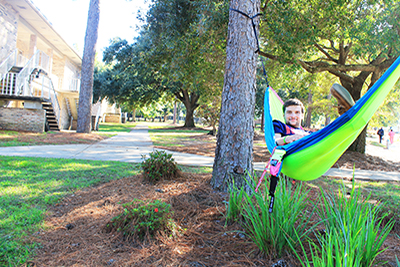 Male student in hammock