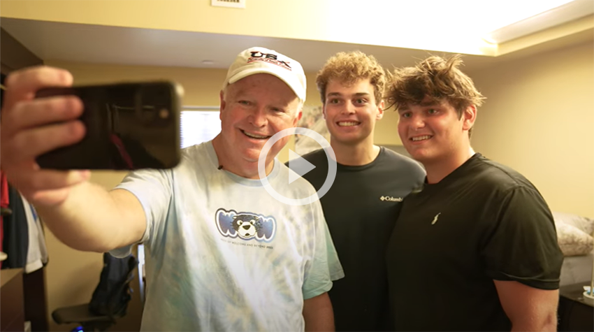 On the Go with Jo - Move In Day with President Bonner talking a selfie with students in their new dorm rooom.