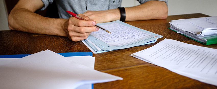 Grading papers on desk